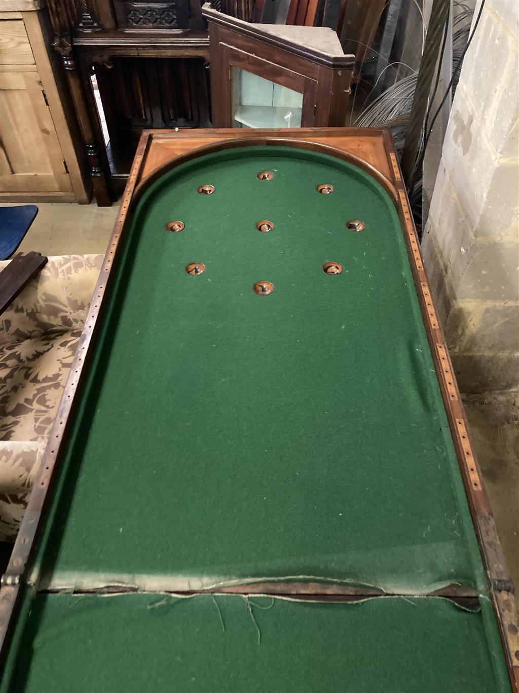 An early Victorian mahogany bagatelle table, width 120cm, depth 64cm, height 90cm